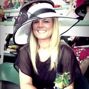 Derby hat- white with black bow. Barely worn.